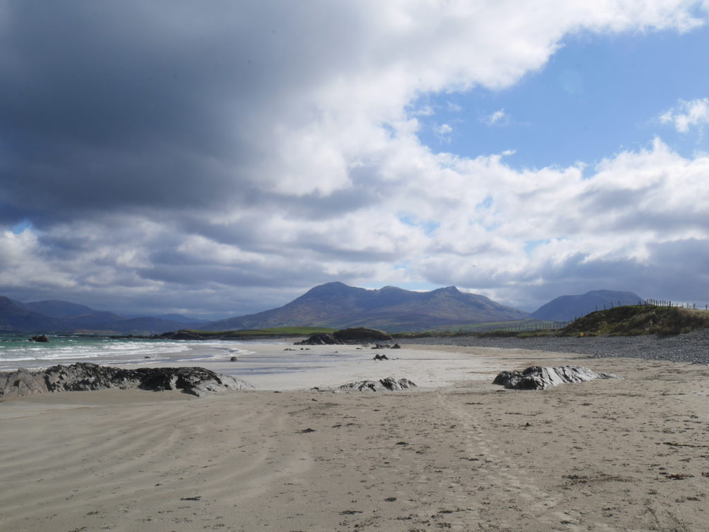 The white strand with some of the bens in the background