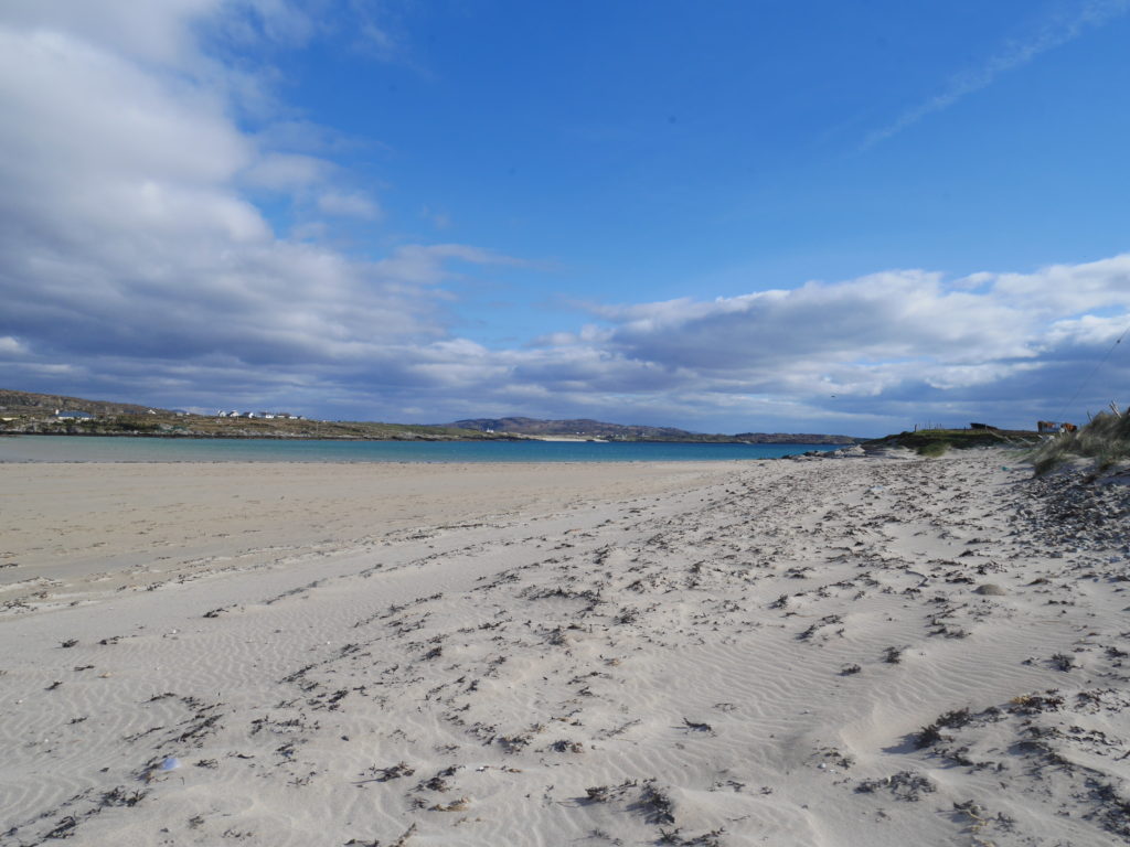 Driving accross Omey Strand