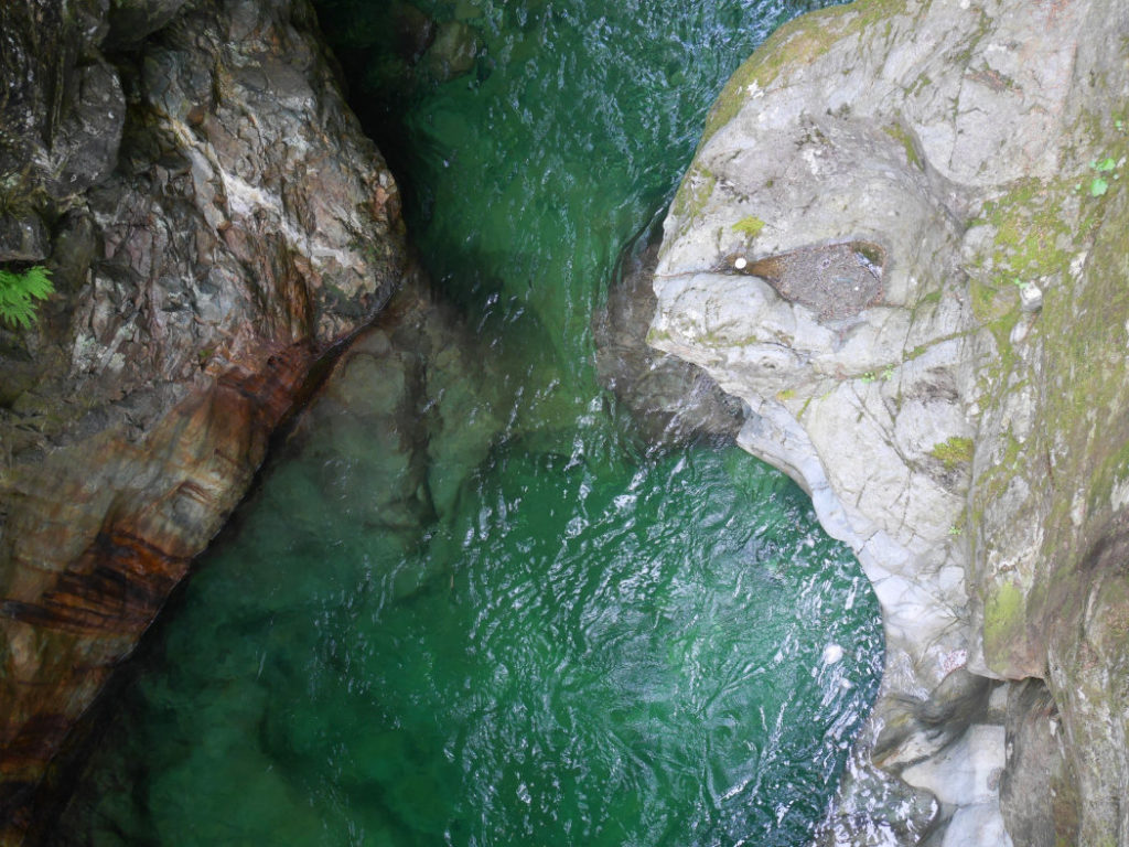 Looking down at the first bridge by the twin falls