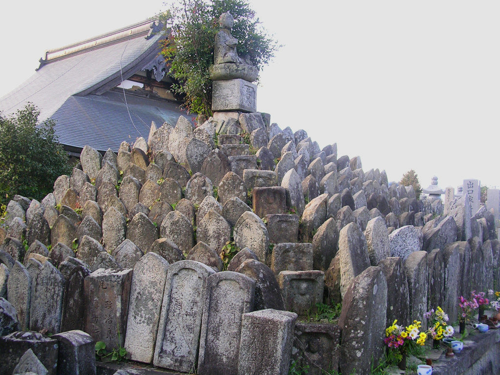 Stones piled up by an old temple