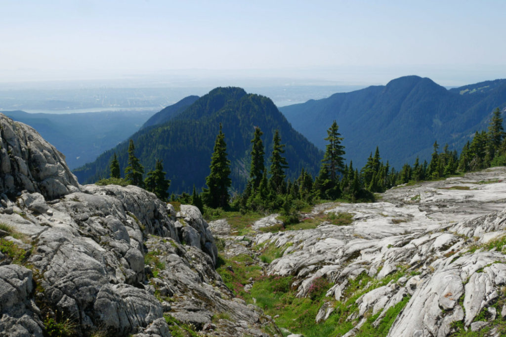 The needles and Lynn Peak to the left Mount Fromme to the right