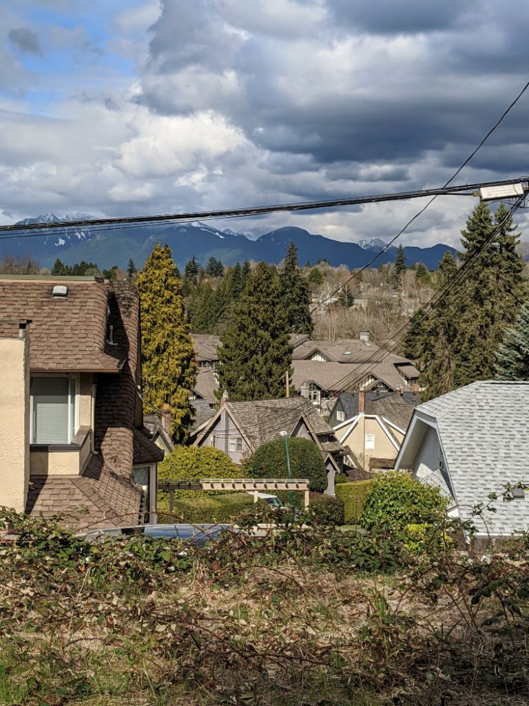 35th Arbutus Greenway - looking over houses and mountains