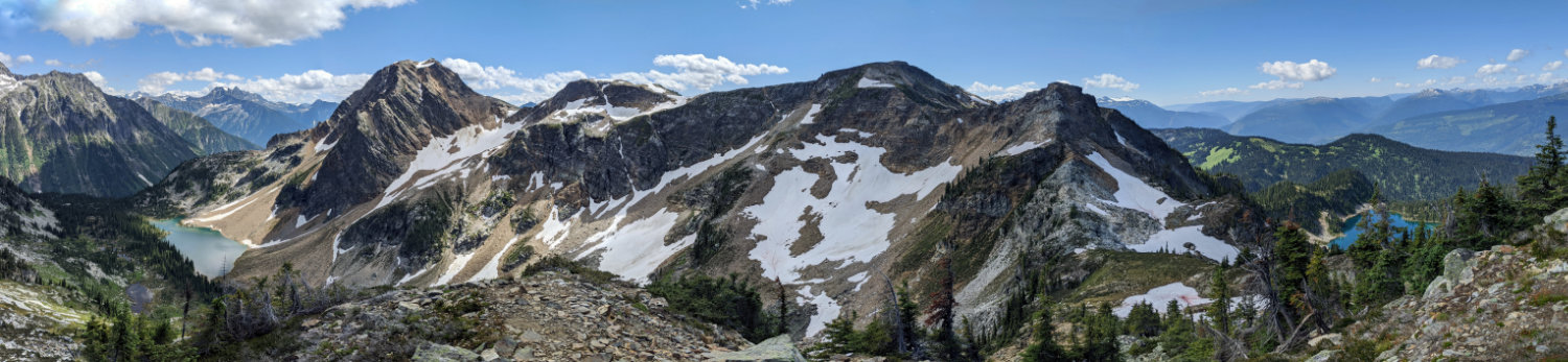and the starting point off in the distance (the tree covered ridge above Miller Lake)